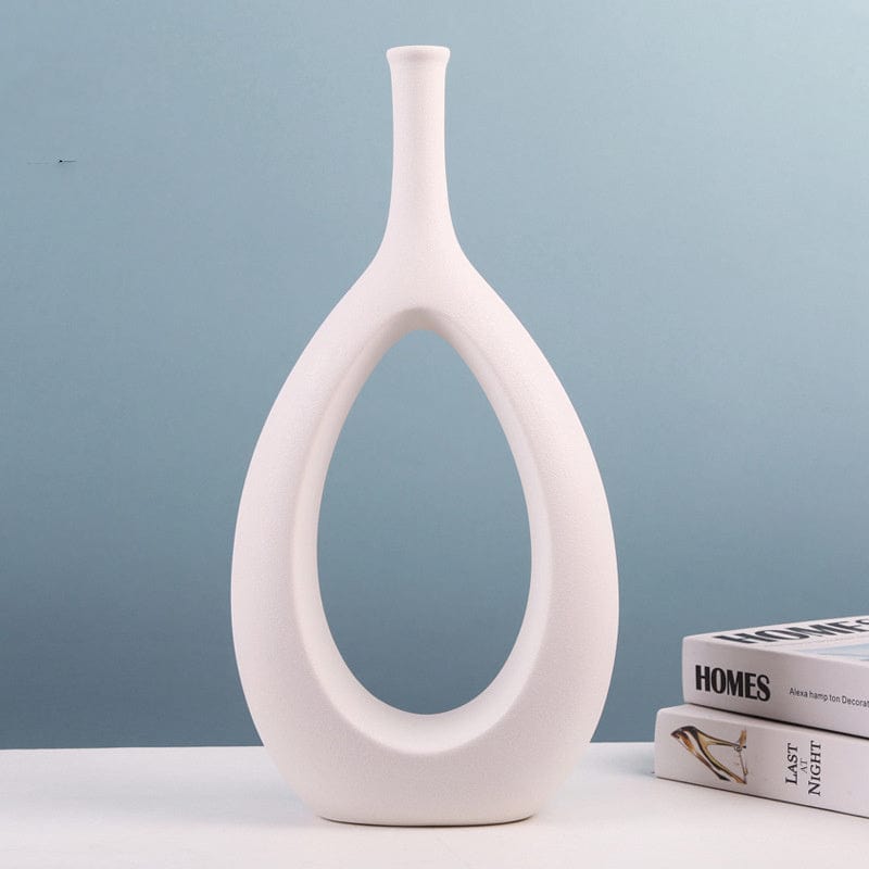 Vase déco ajouré en céramique – Design ovale sculptural noir et blanc