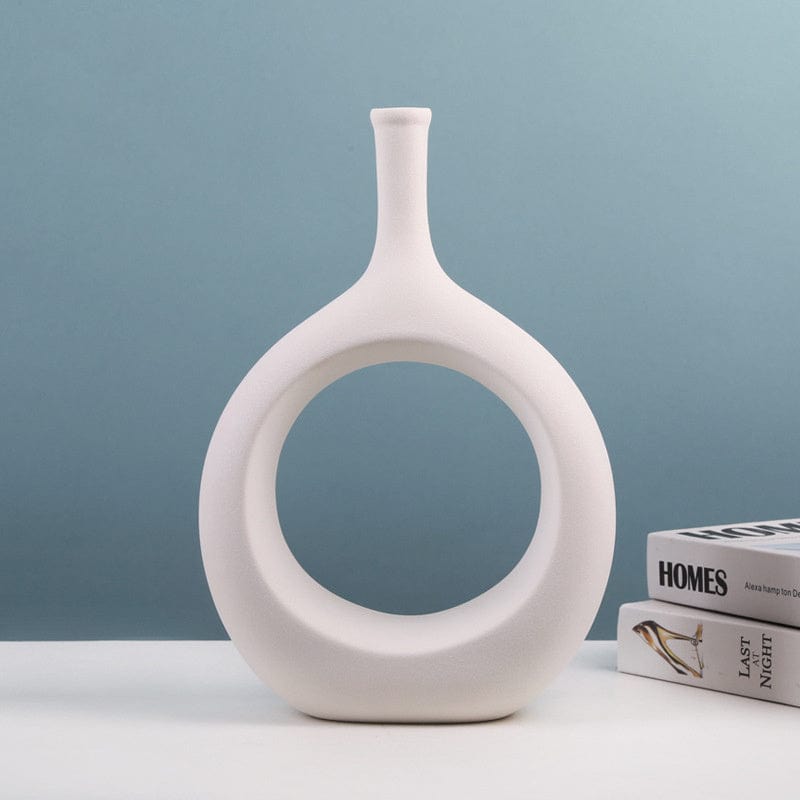 Vase déco ajouré en céramique – Design ovale sculptural noir et blanc