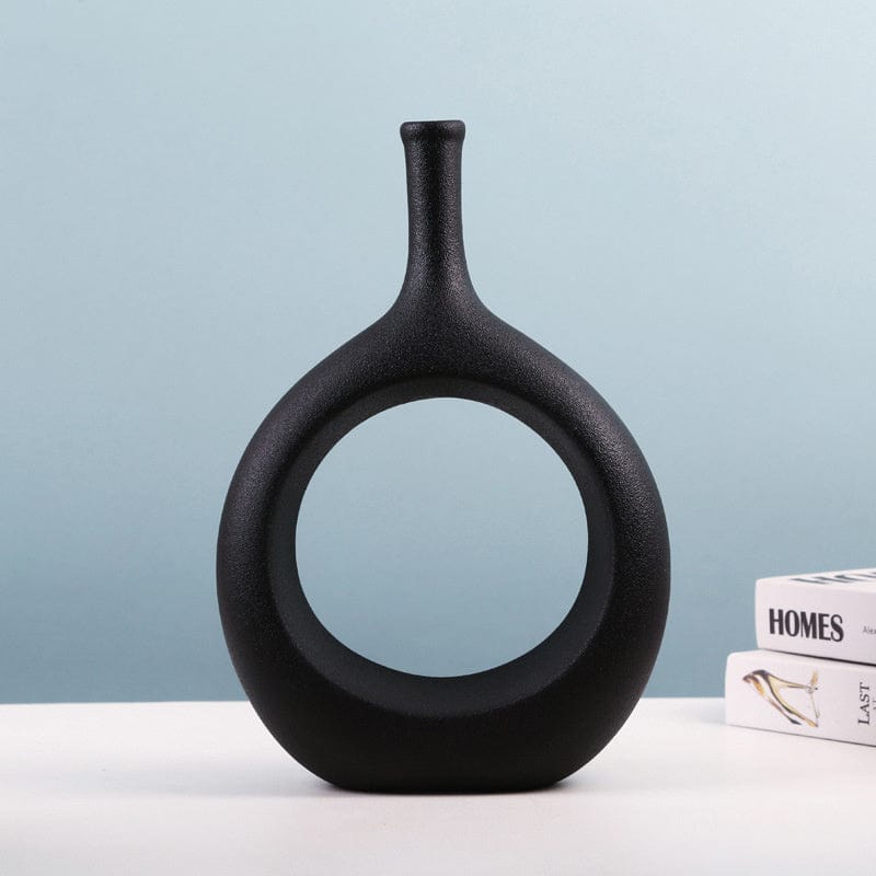 Vase déco ajouré en céramique – Design ovale sculptural noir et blanc