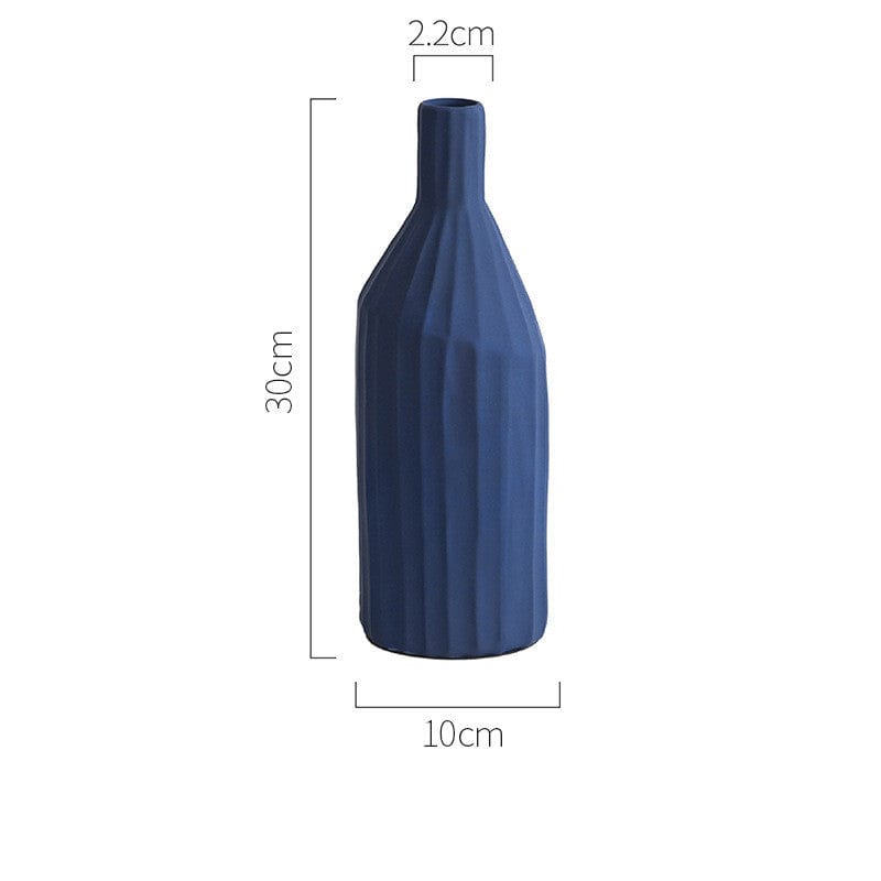 Vase céramique côtelé vert foncé – Élégance minimaliste et naturelle