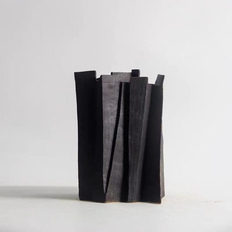 Vase céramique noir sculptural – Élégance brute pour intérieur contemporain