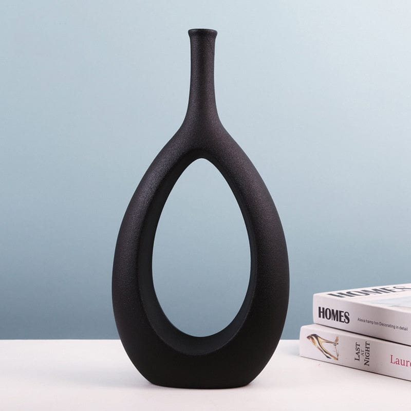 Vase déco ajouré en céramique – Design ovale sculptural noir et blanc