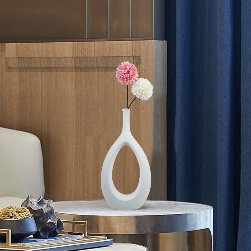Vase déco ajouré en céramique – Design ovale sculptural noir et blanc